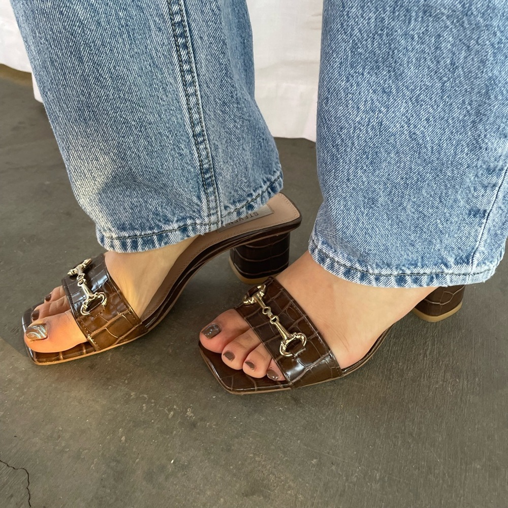 Steve Madden brown snakeskin kitten heels.